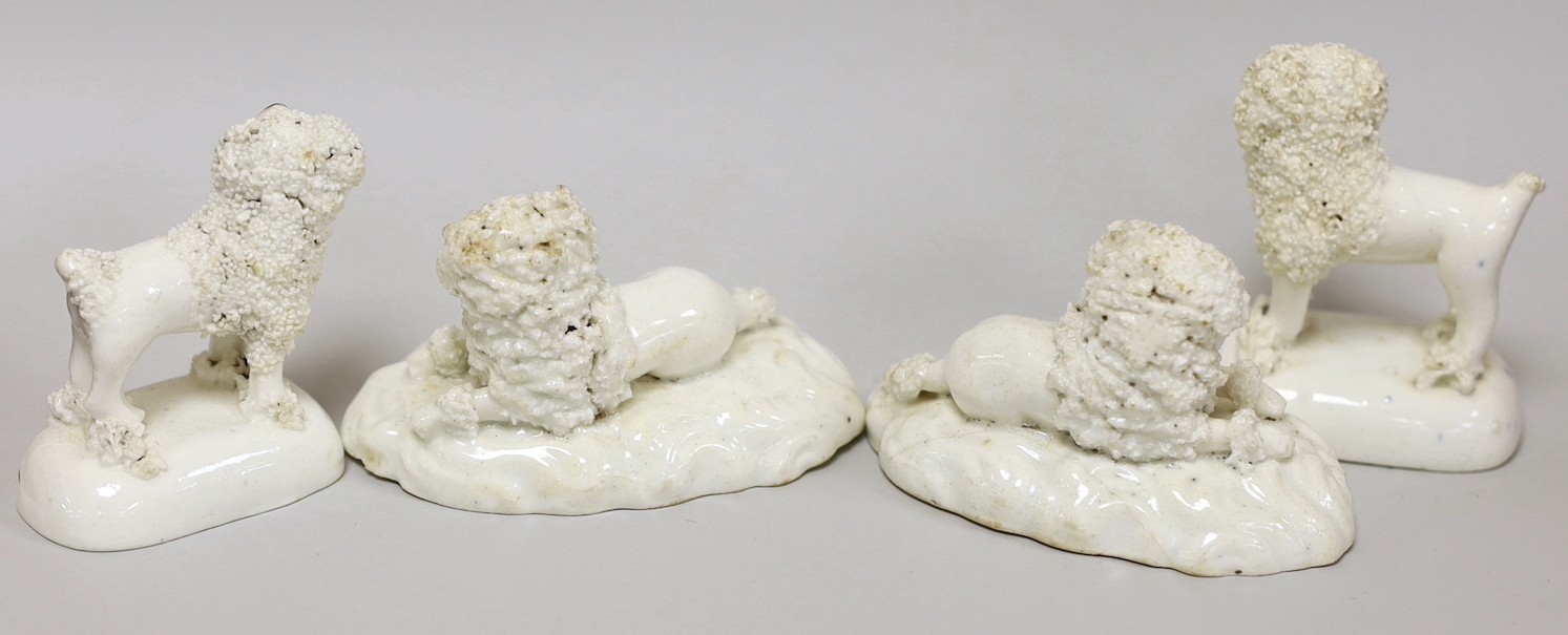 Two pairs of small Staffordshire models of poodles; one pair recumbent and the other standing, c.1830-50, (4), tallest 6cm, Provenance: Dennis G.Rice collection